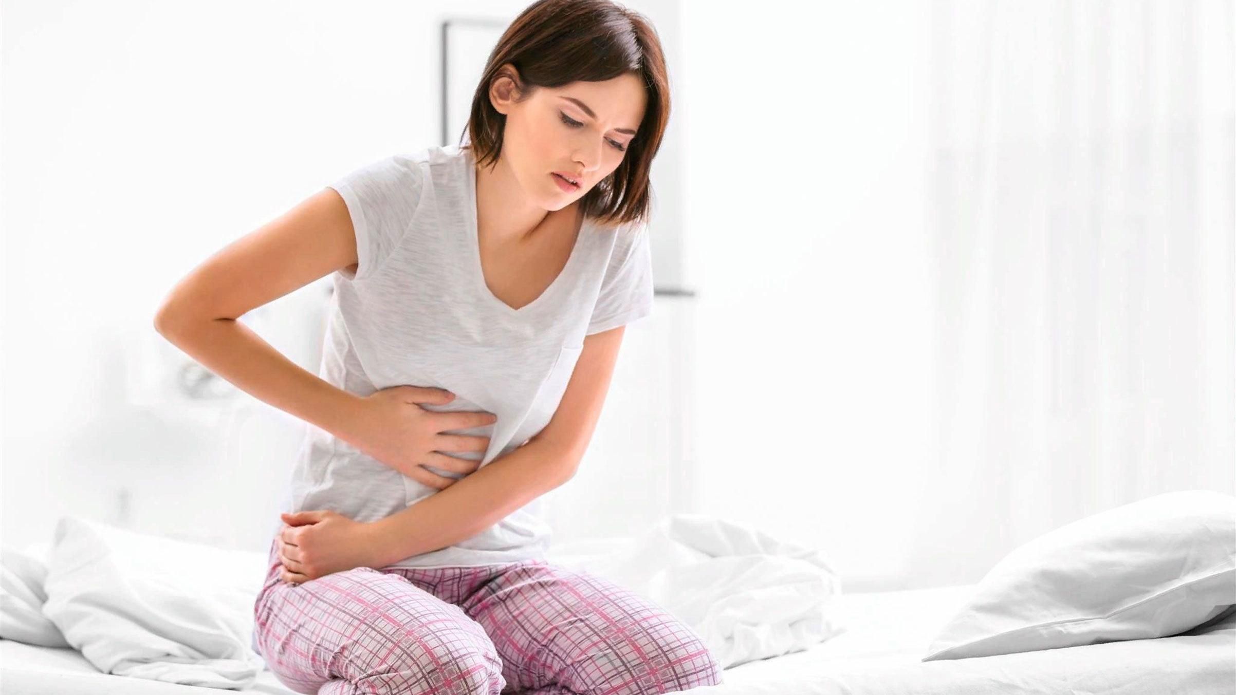 Біль при місячних - як позбутися менструального болю